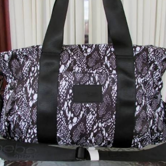 BEBE Sport Becca Large Duffel
Black/White Snake Pr - Picture 3 of 8
